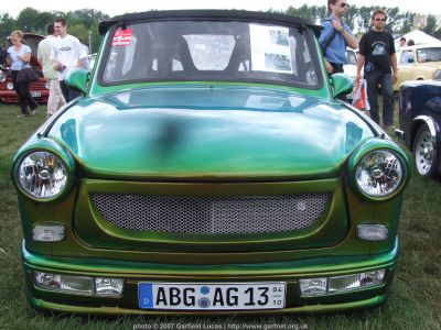 And once you have downed a couple of litres of "Trabi Deluxe" beer, you could always buy a flashy paint-job and a "smiley" radiator grille for your smoky old pride-and-joy!